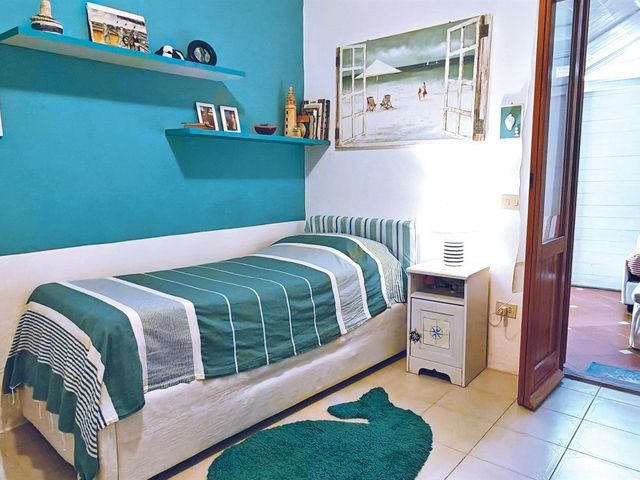 Appartamento ristrutturato con giardino e posto auto