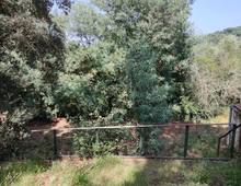 Porzione di bifamiliare con giardino e terreno pertinenziale